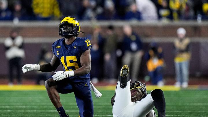 Michigan linebacker Ernest Hausmann (15) tackles Purdue wide receiver Michael Jackson III (2) during the second half at Michigan Stadium in Ann Arbor on Saturday, November 1, 2025. Michigan linebacker Ernest Hausmann (15) tackles Purdue wide receiver Michael Jackson III (2) during the second half at Michigan Stadium in Ann Arbor on Saturday, November 1, 2025.