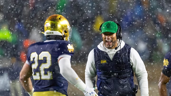 Notre Dame coach Marcus Freeman was named as a potential surprise candidate for an open coaching job.
