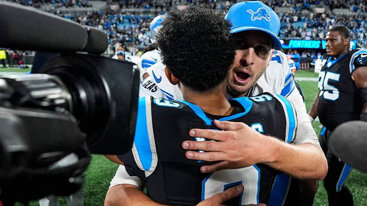 Detroit Lions quarterback Jared Goff (16) hugs Carolina Panthers quarterback Bryce Young (9) after 32-26 loss to Carolina Panthers at Bank of America Stadium in Charlotte on Sunday, Oct. 4, 2026. Detroit Lions quarterback Jared Goff (16) hugs Carolina Panthers quarterback Bryce Young (9) after 32-26 loss to Carolina Panthers at Bank of America Stadium in Charlotte on Sunday, Oct. 4, 2026.