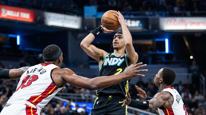 Apr 7, 2024; Indianapolis, Indiana, USA; Indiana Pacers guard Andrew Nembhard (2) shoots the ball
