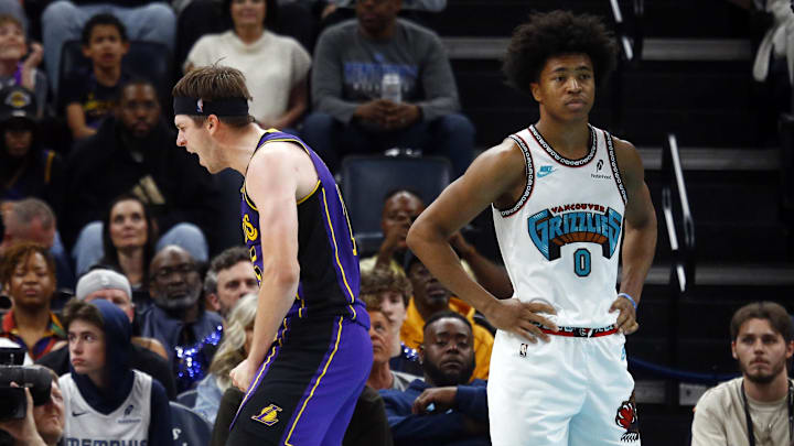 Mar 29, 2025; Memphis, Tennessee, USA; Los Angeles Lakers guard Austin Reaves (15) reacts after a basket during the fourth quarter against the Memphis Grizzlies at FedExForum. Mandatory Credit: Petre Thomas-Imagn Images