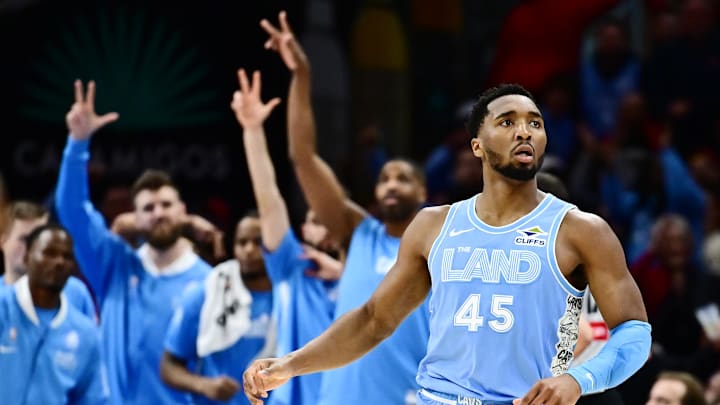 Mar 5, 2025; Cleveland, Ohio, USA; Cleveland Cavaliers guard Donovan Mitchell (45) celebrates after hitting a three point basket during the second half against the Miami Heat at Rocket Arena. Mandatory Credit: Ken Blaze-Imagn Images