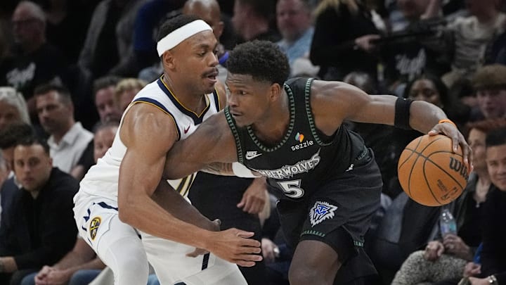 Apr 23, 2026; Minneapolis, Minnesota, USA;  Minnesota Timberwolves guard Anthony Edwards (5) works around Denver Nuggets guard Bruce Brown (11) in the fourth quarter at Target Center. Mandatory Credit: Bruce Kluckhohn-Imagn Images