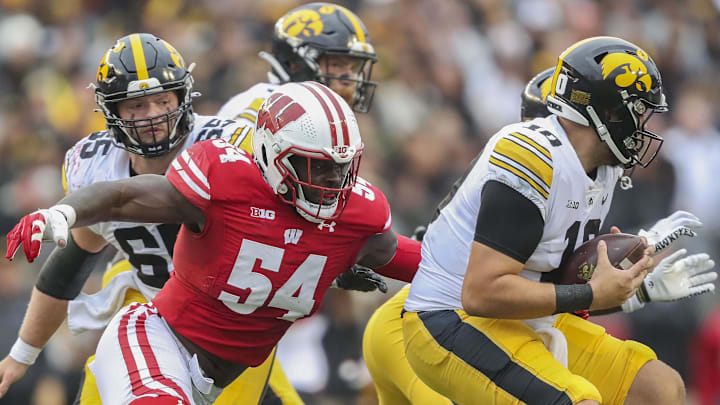 Oct 14, 2023; Madison, Wisconsin, USA; Wisconsin Badgers linebacker Jordan Turner (54) sacks Iowa