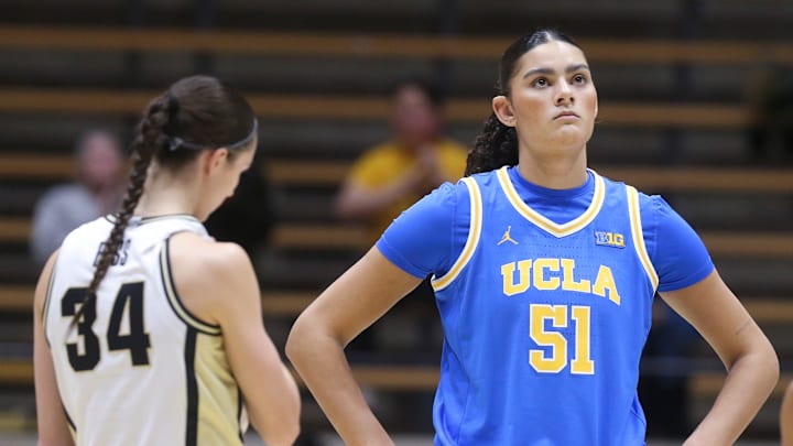 Purdue Boilermakers forward Reagan Bass (34) and UCLA Bruins center Lauren Betts (51) wait for the tipoff Tuesday, Jan. 7, 2025, during NCAA women’s basketball game at Mackey Arena in West Lafayette, Ind.