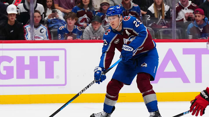 Nov 9, 2024; Denver, Colorado, USA; Colorado Avalanche center Nathan MacKinnon (29) prepares to pass the puck in the second period against the Carolina Hurricanes at Ball Arena. Mandatory Credit: Ron Chenoy-Imagn Images Nov 9, 2024; Denver, Colorado, USA; Colorado Avalanche center Nathan MacKinnon (29) prepares to pass the puck in the second period against the Carolina Hurricanes at Ball Arena. Mandatory Credit: Ron Chenoy-Imagn Images