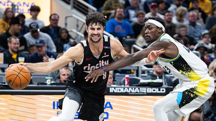 Nov 27, 2024; Indianapolis, Indiana, USA; Portland Trail Blazers forward Deni Avdija (8) dribbles  the ball while Indiana Pacers forward Pascal Siakam (43) defends in the second half at Gainbridge Fieldhouse. Mandatory Credit: Trevor Ruszkowski-Imagn Images