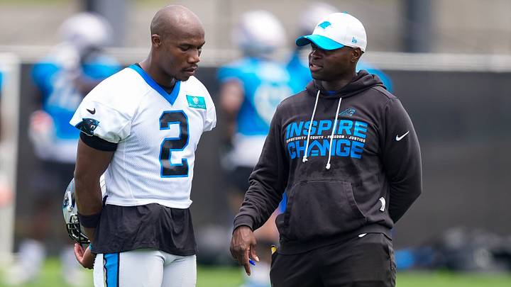 Carolina Panthers cornerback Mike Jackson (2) talks with defensive coach Ejiro Evero during the first day of mini camp at Bank of America Stadium practice facility. Mandatory Credit: Jim Dedmon-Imagn Images Carolina Panthers cornerback Mike Jackson (2) talks with defensive coach Ejiro Evero during the first day of mini camp at Bank of America Stadium practice facility. Mandatory Credit: Jim Dedmon-Imagn Images