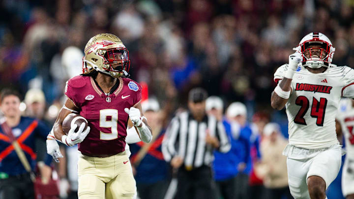 Florida State Seminoles running back Lawrance Toafili (9) sprints down the field towards the end
