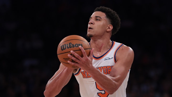 Oct 13, 2025; New York, New York, USA; New York Knicks guard Kevin McCullar Jr. (9) takes a shot during the first half against the Washington Wizards at Madison Square Garden. Mandatory Credit: Vincent Carchietta-Imagn Images