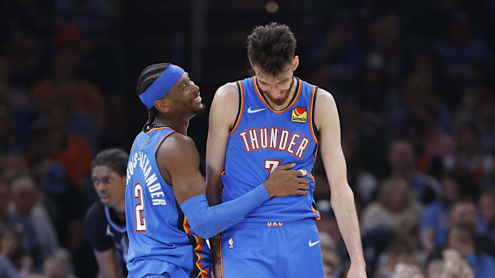 Apr 5, 2026; Oklahoma City, Oklahoma, USA; Oklahoma City Thunder guard Shai Gilgeous-Alexander (2) and center Chet Holmgren (7) laugh after a play against the Utah Jazz during the second half at Paycom Center. Mandatory Credit: Alonzo Adams-Imagn Images