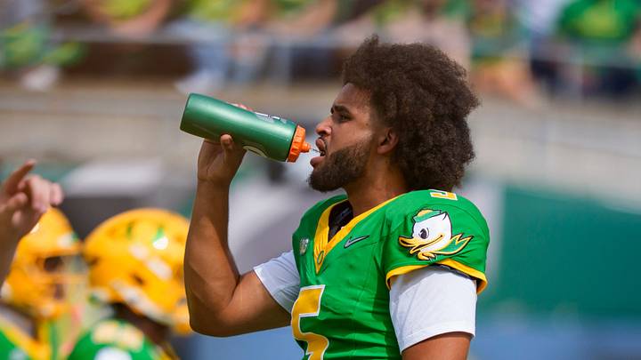 Oregon quarterback Dante Moore drinks water as the Oregon Ducks host the Boise State Broncos on Sept. 5, 2026, at Autzen Stadium in Eugene, Oregon.