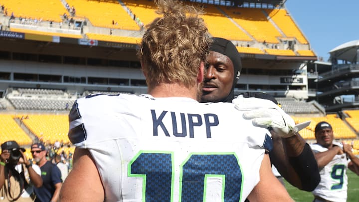 Sep 14, 2025; Pittsburgh, Pennsylvania, USA; Seattle Seahawks wide receiver Cooper Kupp (10) and Pittsburgh Steelers wide receiver DK Metcalf (rear) greet each other after playing at Acrisure Stadium. 