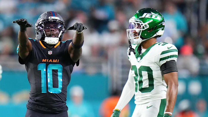 Sep 29, 2025; Miami Gardens, Florida, USA; Miami Dolphins wide receiver Tyreek Hill (10) reacts after a play against the New York Jets during the first half at Hard Rock Stadium. Mandatory Credit: Rich Storry-Imagn Images