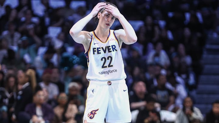 May 18, 2024; Brooklyn, New York, USA;  Indiana Fever guard Caitlin Clark (22) checks back into the