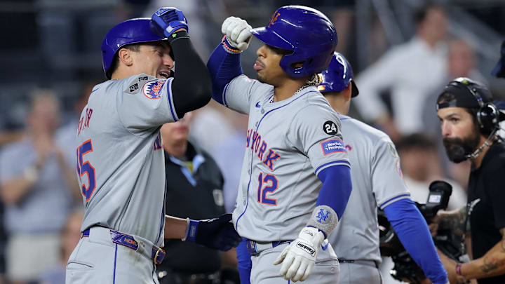 New York Mets shortstop Francisco Lindor (12) celebrates his three run home run against the New York Yankees with center fielder Tyrone Taylor (15) during the eighth inning at Yankee Stadium on July 24.