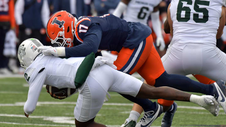 Nov 16, 2024; Champaign, Illinois, USA; Illinois Fighting Illini linebacker Gabe Jacas (17) sacks Michigan State Spartans quarterback Aidan Chiles (2) during the first half at Memorial Stadium. Mandatory Credit: Ron Johnson-Imagn Images Nov 16, 2024; Champaign, Illinois, USA; Illinois Fighting Illini linebacker Gabe Jacas (17) sacks Michigan State Spartans quarterback Aidan Chiles (2) during the first half at Memorial Stadium. Mandatory Credit: Ron Johnson-Imagn Images