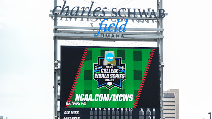 Jun 23, 2022; Omaha, NE, USA;  Signage on the scoreboard before a game between the Arkansas Razorbacks and the Ole Miss Rebels at Charles Schwab Field. Mandatory Credit: Steven Branscombe-Imagn Images