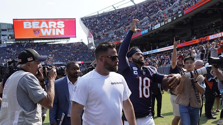 Sep 8, 2024; Chicago, Illinois, USA; Chicago Bears quarterback Caleb Williams (18) celebrates after the Bears beat the Tennessee Titans at Soldier Field. Mandatory Credit: David Banks-Imagn Images