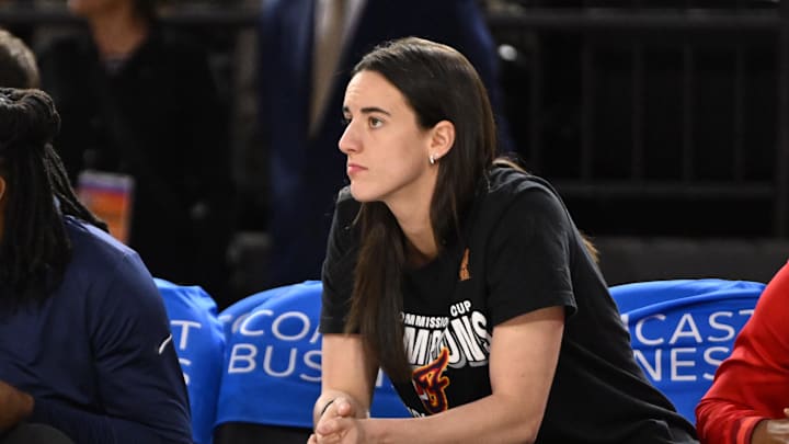 Sep 7, 2025; Baltimore, MD, USA; Indiana Fever guard Caitlin Clark (22) looks on from the bench against the Washington Mystics during the first quarter at CFG Bank Arena. Mandatory Credit: Rafael Suanes-Imagn Images