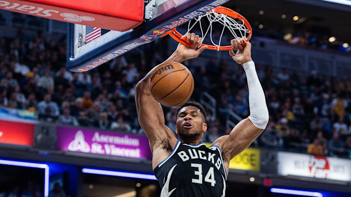 Nov 3, 2025; Indianapolis, Indiana, USA; Milwaukee Bucks forward Giannis Antetokounmpo (34) shoots the ball while Indiana Pacers guard/forward Aaron Nesmith (23)  defends in the second half at Gainbridge Fieldhouse. Mandatory Credit: Trevor Ruszkowski-Imagn Images