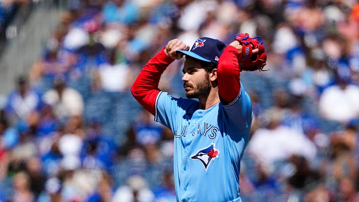 Jun 27, 2026; Toronto, Ontario, CAN; Toronto Blue Jays pitcher Dylan Cease (84) adjusts his hat during the first inning against the Texas Rangers at Rogers Centre. Mandatory Credit: Kevin Sousa-Imagn Images Jun 27, 2026; Toronto, Ontario, CAN; Toronto Blue Jays pitcher Dylan Cease (84) adjusts his hat during the first inning against the Texas Rangers at Rogers Centre. Mandatory Credit: Kevin Sousa-Imagn Images