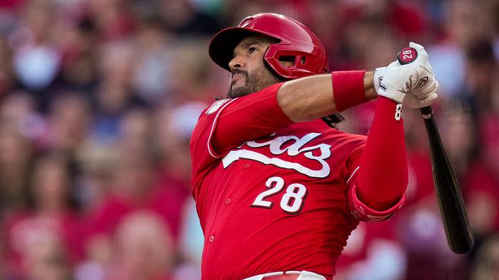 Cincinnati Reds third baseman Eugenio Suárez (28) follows through on a grand slam in the second inning of the MLB National League game between the Cincinnati Reds and the New York Mets at Great American Ball Park in Cincinnati on Monday, June 15, 2026.