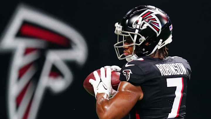 Aug 18, 2023; Atlanta, Georgia, USA; Atlanta Falcons running back Bijan Robinson (7) pulls down a
