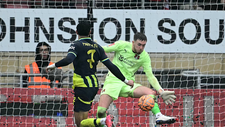 Josh Keeley saves from Omar Marmoush