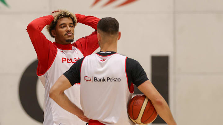 Jeremy Sochan of Poland (L) seen during a training session...
