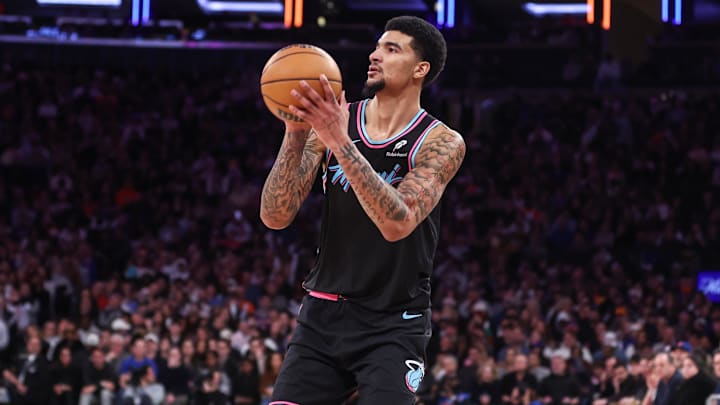 Dec 21, 2025; New York, New York, USA;  Miami Heat center Kel'El Ware (7) takes a three-point shot in the fourth quarter against the New York Knicks at Madison Square Garden. Mandatory Credit: Wendell Cruz-Imagn Images