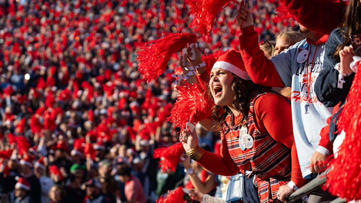 An Ole Miss fan cheers during the first round of the College Football Playoff against Tulane at Vaught-Hemingway Stadium in Oxford, Miss., on Saturday, Dec. 20, 2025. An Ole Miss fan cheers during the first round of the College Football Playoff against Tulane at Vaught-Hemingway Stadium in Oxford, Miss., on Saturday, Dec. 20, 2025.