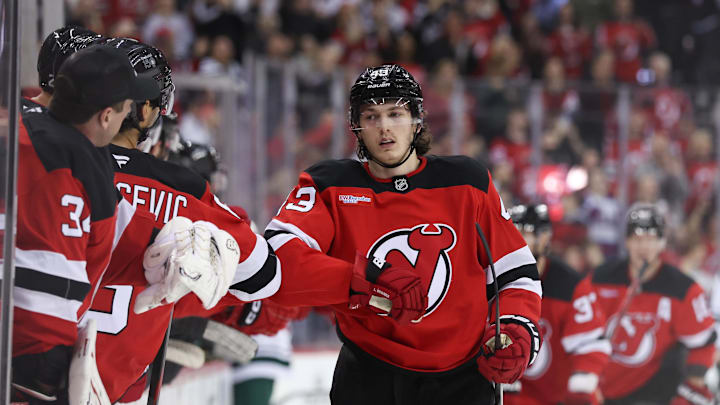 Mar 31, 2025; Newark, New Jersey, USA; New Jersey Devils defenseman Luke Hughes (43) celebrates his goal against the Minnesota Wild during the first period at Prudential Center. Mandatory Credit: Ed Mulholland-Imagn Images
