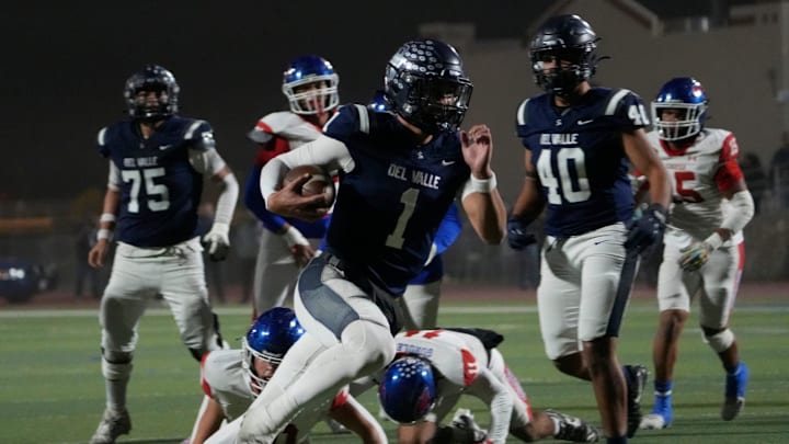 Del Valle High School's Jake Fette runs in for a touchdown in the third quarter against Cooper High School at Del Valle High School on Nov. 14, 2024. Del Valle won their opening playoff game.