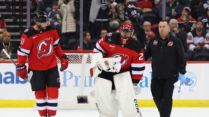 Jan 22, 2025; Newark, New Jersey, USA; New Jersey Devils goaltender Jacob Markstrom (25) is injured during the second period of their game against the Boston Bruins at Prudential Center. Mandatory Credit: Ed Mulholland-Imagn Images