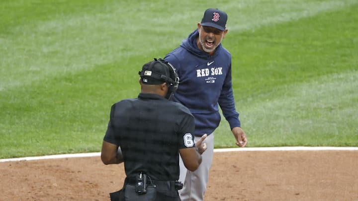 Jun 8, 2024; Chicago, Illinois, USA; Boston Red Sox manager Alex Cora argues with umpire Alan Porter a strikeout call before being ejected during the fifth inning of a baseball game against the Chicago White Sox at Guaranteed Rate Field. Mandatory Credit: Kamil Krzaczynski-Imagn Images