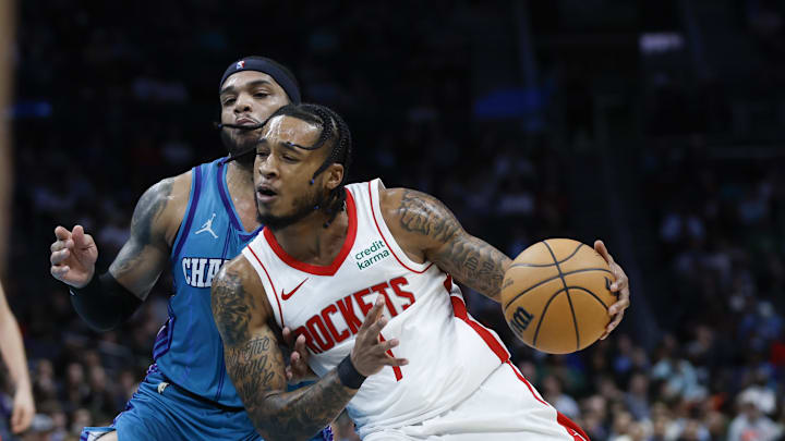 Jan 26, 2024; Charlotte, North Carolina, USA; Houston Rockets forward Cam Whitmore (7) moves against Charlotte Hornets forward Miles Bridges (0) during the second half at Spectrum Center. Mandatory Credit: Nell Redmond-Imagn Images Jan 26, 2024; Charlotte, North Carolina, USA; Houston Rockets forward Cam Whitmore (7) moves against Charlotte Hornets forward Miles Bridges (0) during the second half at Spectrum Center. Mandatory Credit: Nell Redmond-Imagn Images