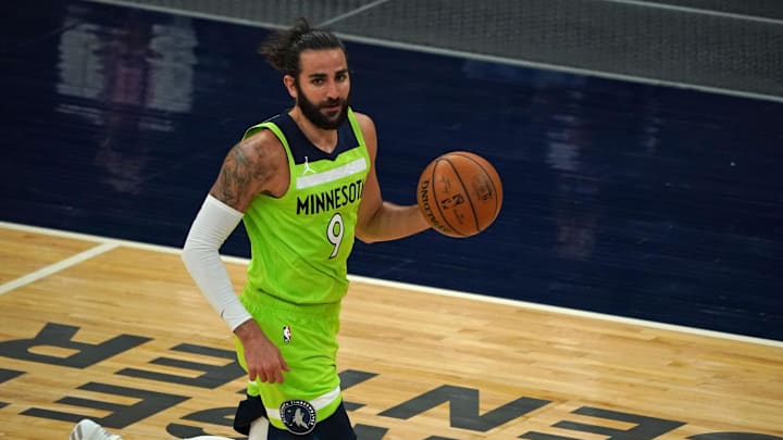 May 15, 2021; Minneapolis, Minnesota, USA;  Minnesota Timberwolves guard Ricky Rubio (9) brings the ball up-court against the Boston Celtics at Target Center. Mandatory Credit: Nick Wosika-Imagn Images