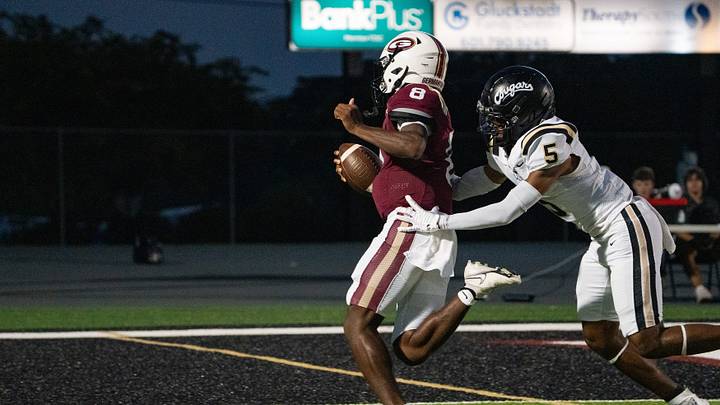 Germantown quarterback Langston Branson (8) scores a touchdown during the game against Northwest Rankin in Madison, Miss., on Friday, Aug. 28, 2026.