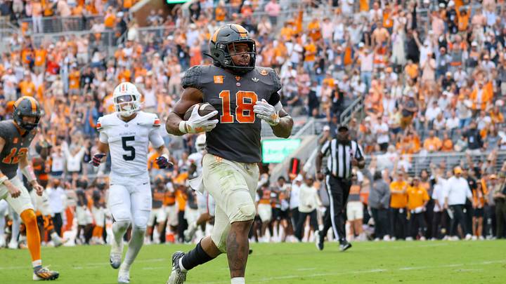 Oct 3, 2026; Knoxville, Tennessee, USA; Tennessee Volunteers running back DeSean Bishop (18) runs for a touchdown against the Auburn Tigers during the second half at Neyland Stadium. Mandatory Credit: Randy Sartin-Imagn Images Oct 3, 2026; Knoxville, Tennessee, USA; Tennessee Volunteers running back DeSean Bishop (18) runs for a touchdown against the Auburn Tigers during the second half at Neyland Stadium. Mandatory Credit: Randy Sartin-Imagn Images