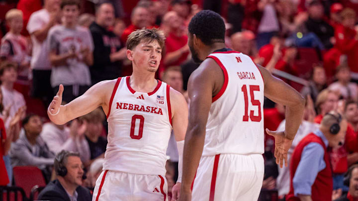 Nebraska guard Connor Essegian celebrates with teammate Jared Garcia after a second-half bucket against BYU.