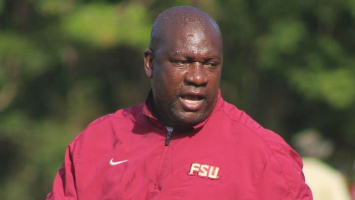 Florida State Seminoles running backs coach David Johnson shouts instructions during practice.