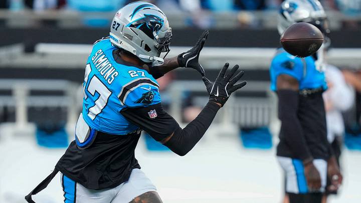 Carolina Panthers safety Isaiah Simmons (27) makes a catch during Fanfest Carolina Panthers safety Isaiah Simmons (27) makes a catch during Fanfest