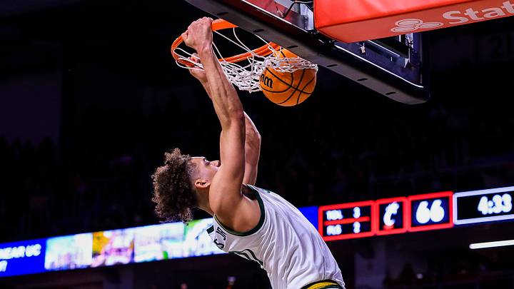 Jan 28, 2026; Cincinnati, Ohio, USA; Baylor Bears guard Dan Skillings Jr. (0) dunks on the Cincinnati Bearcats in the second half at Fifth Third Arena.