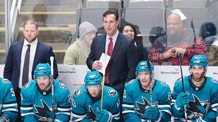 Nov 5, 2022; San Jose, California, USA; San Jose Sharks head coach David Quinn and assistant coach Ryan Warsofsky behind the bench during the third period against the Anaheim Ducks at SAP Center at San Jose. Mandatory Credit: Robert Edwards-USA TODAY Sports