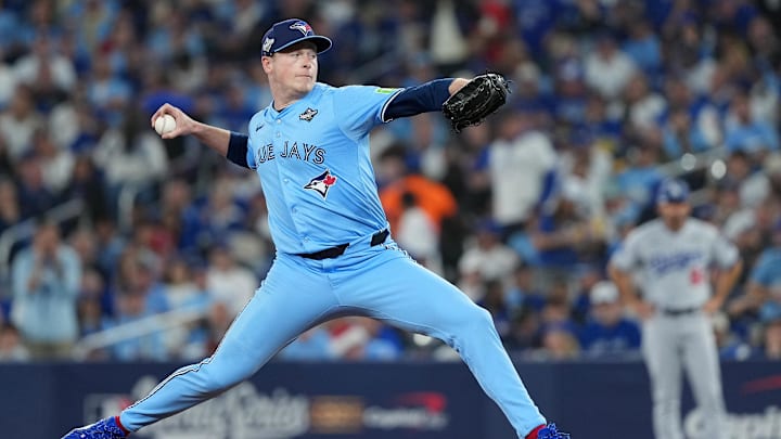 Oct 31, 2025; Toronto, Ontario, CAN; Toronto Blue Jays pitcher Louis Varland (77) throws a pitch in the seventh inning against the Los Angeles Dodgers for game six of the 2025 MLB World Series at Rogers Centre. Mandatory Credit: Nick Turchiaro-Imagn Images