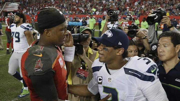 Jameis Winston and Russell Wilson shake hands in 2016.