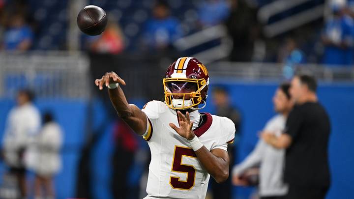 Aug 22, 2026; Detroit, Michigan, USA;  Washington Commanders quarterback Jayden Daniels (5) throws passes during pregame warmups before their preseason game against the Detroit Lions at Ford Field.  Mandatory Credit: Lon Horwedel-Imagn Images