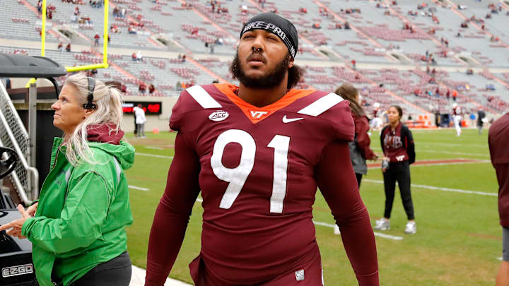 Oct 16, 2021; Blacksburg, Virginia, USA; Virginia Tech Hokies tight end Wilfried Pene (91) walks on the field before the game against the Pittsburgh Panthers at Lane Stadium. Mandatory Credit: Reinhold Matay-Imagn Images Oct 16, 2021; Blacksburg, Virginia, USA; Virginia Tech Hokies tight end Wilfried Pene (91) walks on the field before the game against the Pittsburgh Panthers at Lane Stadium. Mandatory Credit: Reinhold Matay-Imagn Images
