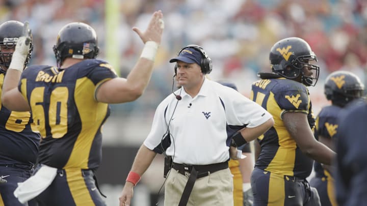 Jan 01, 2005; Jacksonville, FL, USA;  West Virginia Mountaineers headcoach Rich Rodriguez walks the sidelines after West Virginia was successful on a third quarter field goal attempt in the 2005 Toyota Gator Bowl held at Alltel Stadium. Mandatory Credit: Photo by Imagn Images (©) Copyright 2004 by Preston Mack